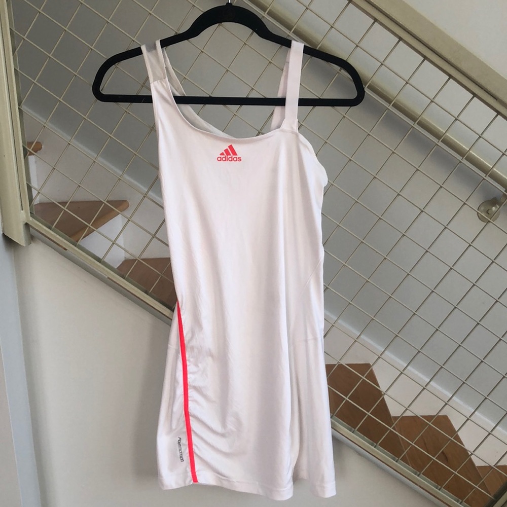 Cute white and orange Addidas “adizero” women’s tennis dress